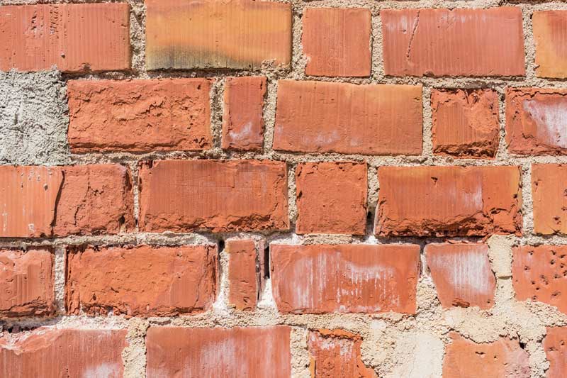 Close-up of red brick wall texture
