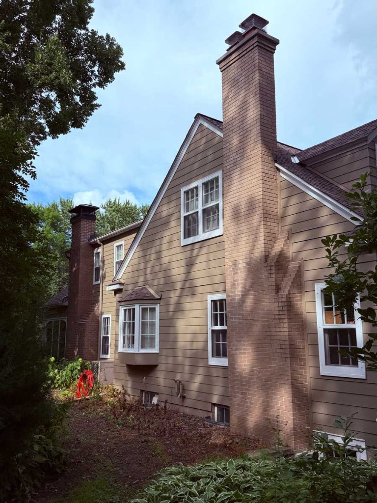 Brick chimney on the exterior of a residential home